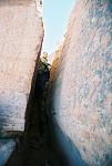 Jake in the "Crack in the Rock" entrance to Coyote Gulch